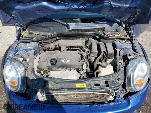 2014 MINI Convertible z VIN WMWZN3C58ET861186, wystawiony jako Copart lot #50585755 z przebiegiem 81 459 mil mil oraz Szkoda całkowita • Salvage title. Historia ofert i sprzedaży dostępna na DreamBid. Obrazek 12.