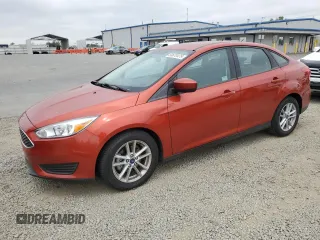 2018 Ford Focus SE with VIN 1FADP3F24JL287615, listed as a Copart auction lot 58670475 with 93,062 mi miles and Clean title. Bid and sale history available at DreamBid. Image 1.