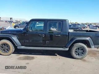 2022 Jeep Gladiator Texas Trail with VIN 1C6HJTAG7NL128584, listed as a IAAI auction lot 40630493 with Not Provided miles and . Bid and sale history available at DreamBid. Image 14.