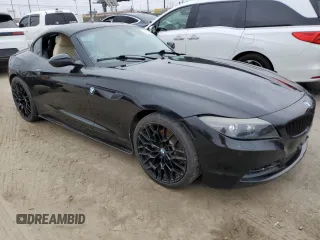 2012 BMW Z4 sDrive28i with VIN WBALL5C56CE716558, listed as a Copart auction lot 62003125 with 93,438 mi miles and Salvage title. Bid and sale history available at DreamBid. Image 4.