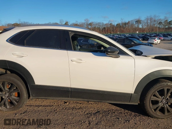 2021 Mazda CX-30 Premium with VIN 3MVDMBDY2MM236118, listed as a IAAI auction lot 41182309 with 32,286 mi miles and . Bid and sale history available at carsss.com. Image 12.