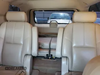 2009 GMC Yukon SLT w/4SA with VIN 1GKEC33309R214195, listed as a Copart auction lot 61430404 with 174,776 mi miles and Salvage Title. Bid and sale history available at carsss.com. Image 10.