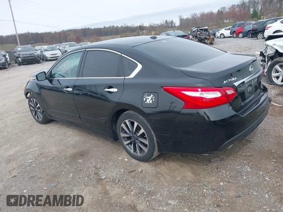 2016 Nissan Altima SR with VIN 1N4AL3AP1GC128738, listed as a IAAI auction lot 41948182 with 156,880 mi miles and . Bid and sale history available at DreamBid. Image 3.