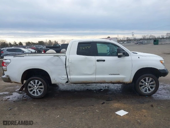 2012 Toyota Tundra 4WD Truck with VIN 5TFUM5F16CX036743, listed as a IAAI auction lot 41618964 with 134,413 mi miles. Bid and sale history available at carsss.com. Image 13.