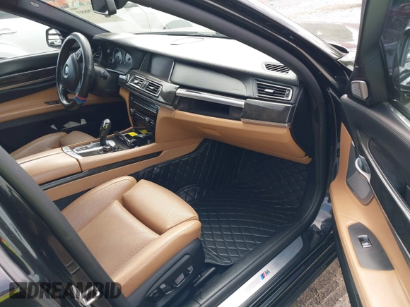 2013 BMW 7 Series 750Li z VIN WBAYE8C59DD133605, wystawiony jako IAAI lot #42179893 z przebiegiem 73 065 mil mil oraz . Historia ofert i sprzedaży dostępna na DreamBid. Obrazek 5.