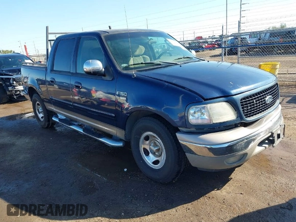 2002 Ford F-150 XLT with VIN 1FTRW07692KC25069, listed as a IAAI auction lot 41387047 with 208,811 mi miles. Bid and sale history available at carsss.com. Image 1.