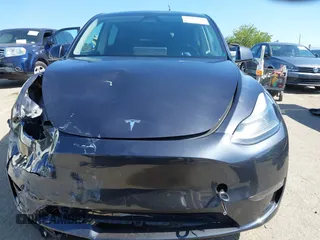 2024 Tesla Model Y z VIN 7SAYGDED4RF115252, wystawiony jako IAAI lot #42302658 z przebiegiem 7 365 mil mil oraz . Historia ofert i sprzedaży dostępna na DreamBid. Obrazek 12.