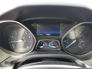 2018 Ford Focus SE z VIN 1FADP3F2XJL276652, wystawiony jako Copart lot #57499965 z przebiegiem 112 388 mil mil oraz Szkoda całkowita • Salvage title. Historia ofert i sprzedaży dostępna na DreamBid. Obrazek 9.