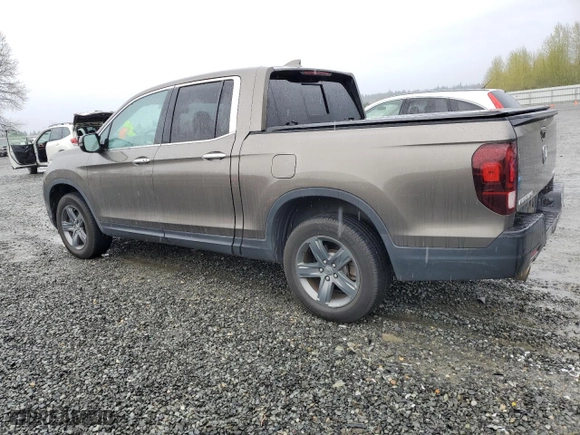 2021 Honda Ridgeline RTL-E with VIN 5FPYK3F78MB016027, listed as a Copart auction lot 52218845 with 67,428 mi miles and Salvage Title. Bid and sale history available at carsss.com. Image 2.