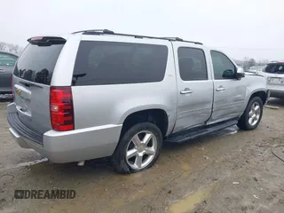 2014 Chevrolet Suburban LTZ with VIN 1GNSCKE05ER173446, listed as a IAAI auction lot 41047096 with 189,049 mi miles and . Bid and sale history available at DreamBid. Image 4.