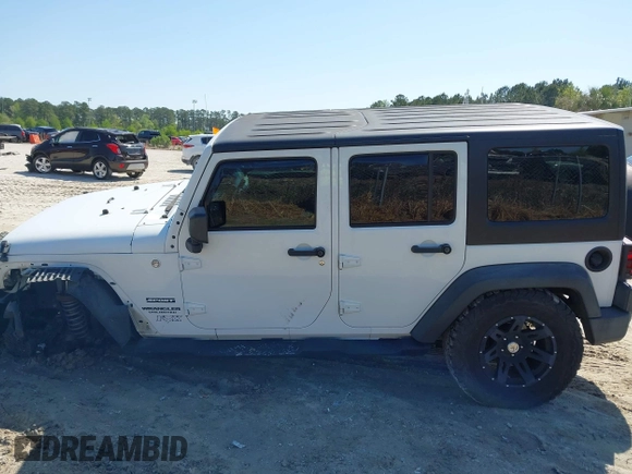 2015 Jeep Wrangler Unlimited Willys Wheeler with VIN 1C4BJWDG0FL546000, listed as a IAAI auction lot 41984566 with 112,742 mi miles and . Bid and sale history available at DreamBid. Image 14.