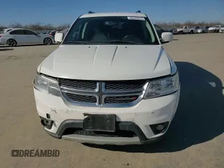 2017 Dodge Journey SXT with VIN 3C4PDCBB8HT675449, listed as a Copart auction lot 88999075 with 105,765 mi miles and Salvage Title. Bid and sale history available at DreamBid. Image 11.