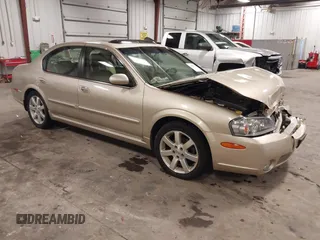 2002 Nissan Maxima GLE z VIN JN1DA31AX2T305310, wystawiony jako IAAI lot #42302521 z przebiegiem 68 920 mil mil oraz . Historia ofert i sprzedaży dostępna na DreamBid. Obrazek 1.