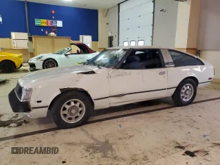 1981 Toyota Celica z VIN JT2RA44L3B0007679, wystawiony jako Copart lot #48892425 z przebiegiem 96 534 mil mil oraz Czysty tytuł • Clean title. Historia ofert i sprzedaży dostępna na DreamBid. Obrazek 1.