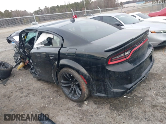 2022 Dodge Charger Scat Pack Widebody with VIN 2C3CDXGJXNH101398, listed as a IAAI auction lot 41408112 with 72,625 mi miles and . Bid and sale history available at DreamBid. Image 3.