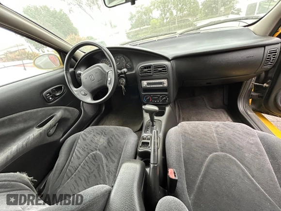 2001 Saturn SC with VIN 1G8ZY12771Z105142, listed as a Copart auction lot 54940825 with 166,396 mi miles and Clean Title. Bid and sale history available at carsss.com. Image 9.