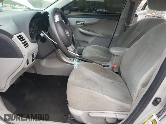 2013 Toyota Corolla L with VIN 2T1BU4EE0DC988708, listed as a Copart auction lot 52092375 with 165,895 mi miles and Salvage Title. Bid and sale history available at carsss.com. Image 7.