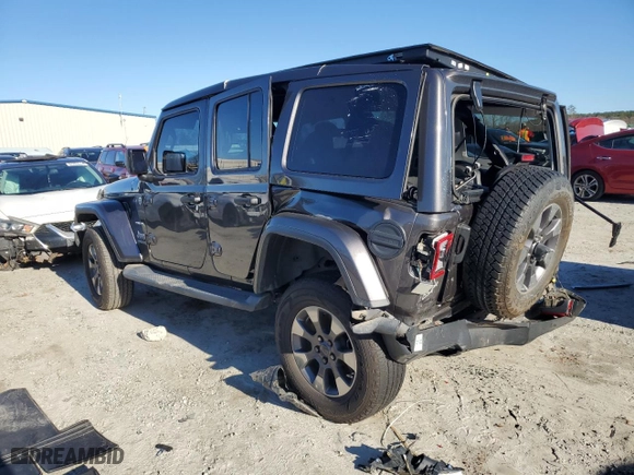 2019 Jeep Wrangler Unlimited Sahara with VIN 1C4HJXEG7KW637630, listed as a Copart auction lot 87192764 with 52,301 mi miles and Salvage Title. Bid and sale history available at carsss.com. Image 2.