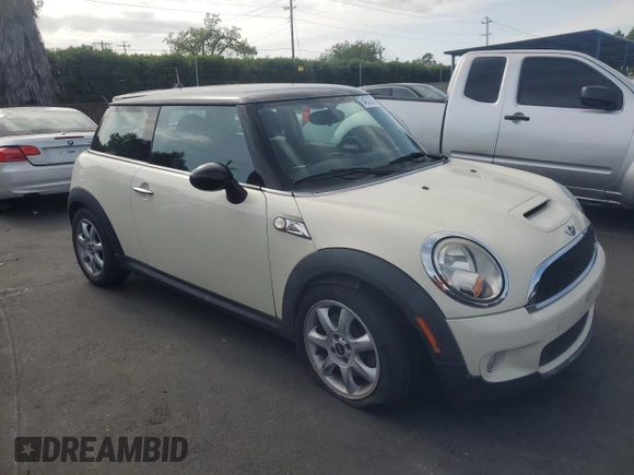 2010 MINI Hardtop S with VIN WMWMF7C59ATZ69213, listed as a Copart auction lot 54270705 with 77,594 mi miles and Salvage Title. Bid and sale history available at DreamBid. Image 4.