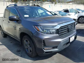 2021 Honda Ridgeline RTL with VIN 5FPYK3F51MB027546, listed as a IAAI auction lot 41598410 with 17,948 mi miles. Bid and sale history available at carsss.com. Image 1.