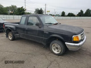 1997 Ford Ranger XL with VIN 1FTCR14A2VPB52159, listed as a Copart auction lot 63452045 with 207,582 mi miles and Salvage title. Bid and sale history available at DreamBid. Image 4.