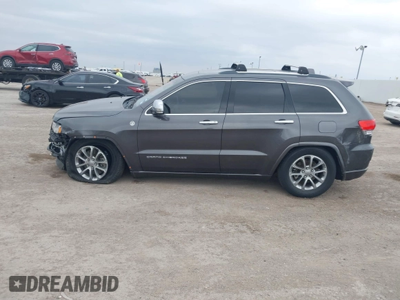 2015 Jeep Grand Cherokee Overland with VIN 1C4RJFCT3FC131122, listed as a IAAI auction lot 41513892 with 125,765 mi miles. Bid and sale history available at carsss.com. Image 14.