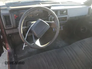 1989 Nissan Hardbody z VIN 1N6ND11S7KC371977, wystawiony jako Copart lot #77245404 z przebiegiem 202 526 mil mil oraz Tytuł czysty. Historia ofert i sprzedaży dostępna na DreamBid. Obrazek 8.