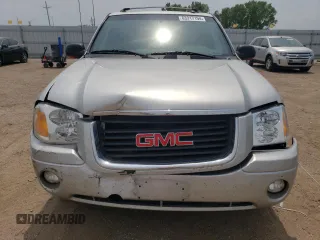 2004 GMC Envoy SLT with VIN 1GKDT13S842439635, listed as a Copart auction lot 63317194 with 201,672 mi miles and Salvage Title. Bid and sale history available at carsss.com. Image 5.