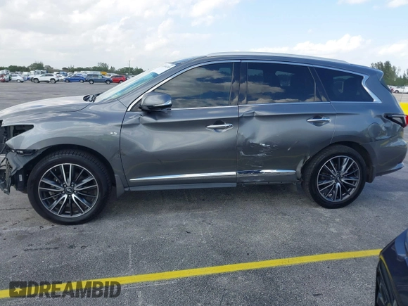2016 Infiniti QX60 with VIN 5N1AL0MM1GC510760, listed as a IAAI auction lot 41990248 with 60,296 mi miles and . Bid and sale history available at DreamBid. Image 6.
