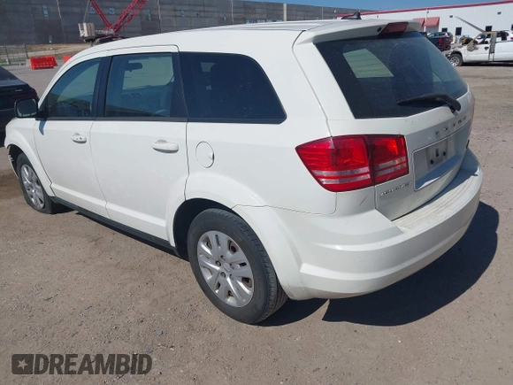 2014 Dodge Journey SE with VIN 3C4PDCAB2ET258681, listed as a IAAI auction lot 42558132 with 136,569 mi miles and . Bid and sale history available at DreamBid. Image 3.