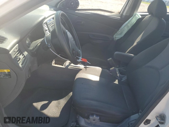 2010 Kia Rio LX with VIN KNADH4A31A6635895, listed as a Copart auction lot 61308434 with 209,016 mi miles and Salvage Title. Bid and sale history available at carsss.com. Image 7.