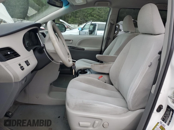 2012 Toyota Sienna LE AAS with VIN 5TDKK3DC8CS265274, listed as a Copart auction lot 54058245 with 175,063 mi miles and Salvage title. Bid and sale history available at DreamBid. Image 7.