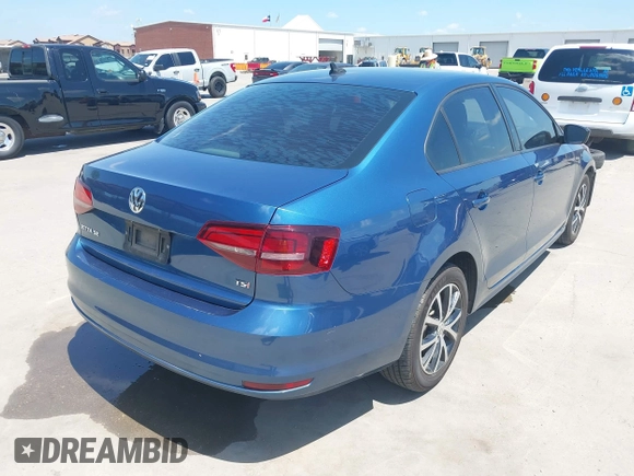 2016 Volkswagen Jetta Sedan 1.4T SE with VIN 3VWD67AJ8GM218112, listed as a IAAI auction lot 42061478 with 84,860 mi miles. Bid and sale history available at carsss.com. Image 4.