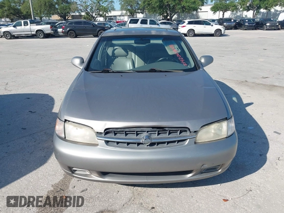 1999 Nissan Altima XE with VIN 1N4DL01D1XC255927, listed as a IAAI auction lot 42003101 with 154,000 mi miles. Bid and sale history available at carsss.com. Image 12.