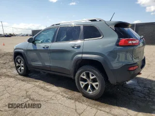 2014 Jeep Cherokee Trailhawk with VIN 1C4PJMBB4EW203320, listed as a Copart auction lot 53875305 with 112,425 mi miles and Clean Title. Bid and sale history available at carsss.com. Image 2.