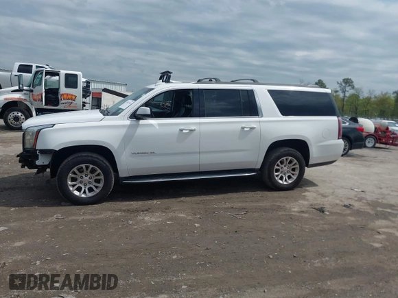 2019 GMC Yukon XL SLT with VIN 1GKS2GKC3KR160900, listed as a IAAI auction lot 41987464 with 88,854 mi miles and . Bid and sale history available at carsss.com. Image 14.
