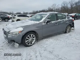 2014 Infiniti Q50 Hybrid Premium with VIN JN1AV7AR1EM701421, listed as a Copart auction lot 88671445 with 112,145 mi miles and Salvage Title. Bid and sale history available at carsss.com. Image 1.