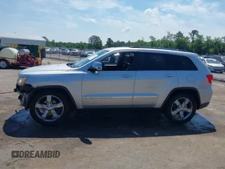 2011 Jeep Grand Cherokee Overland with VIN 1J4RR6GGXBC526649, listed as a IAAI auction lot 42162327 with 185,129 mi miles and . Bid and sale history available at DreamBid. Image 14.