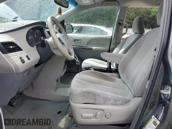 2014 Toyota Sienna LE AAS with VIN 5TDKK3DC3ES475493, listed as a Copart auction lot 56949585 with 269,528 mi miles and Salvage title. Bid and sale history available at DreamBid. Image 7.