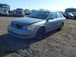 2001 Toyota Avalon XL w/Bucket Seats with VIN 4T1BF28B91U148985, listed as a IAAI auction lot 41538121 with 161,474 mi miles. Bid and sale history available at carsss.com. Image 2.