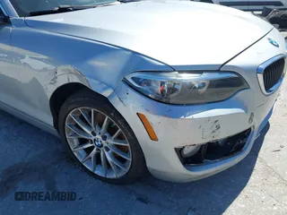 2015 BMW 2 Series 228i with VIN WBA1F5C58FV257570, listed as a IAAI auction lot 41783929 with 229,893 mi miles. Bid and sale history available at carsss.com. Image 6.