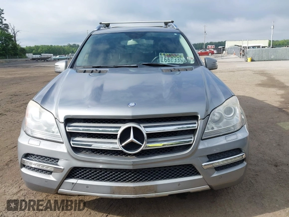 2012 Mercedes-Benz GL 450 z VIN 4JGBF7BEXCA766840, wystawiony jako IAAI lot #42521600 z przebiegiem 154 811 mil mil oraz . Historia ofert i sprzedaży dostępna na DreamBid. Obrazek 12.
