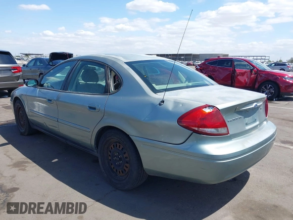 2005 Ford Taurus SE with VIN 1FAFP53U75A226240, listed as a IAAI auction lot 42066974 with 190,043 mi miles. Bid and sale history available at carsss.com. Image 3.