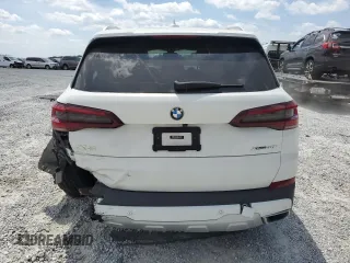 2021 BMW X5 xDrive40i z VIN 5UXCR6C07M9H21128, wystawiony jako Copart lot #54084915 z przebiegiem 26 966 mil mil oraz Szkody całkowita. Historia ofert i sprzedaży dostępna na DreamBid. Obrazek 6.