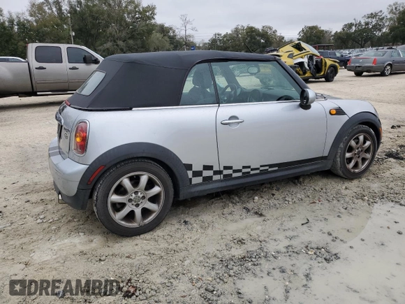 2009 MINI Convertible с VIN WMWMR33579TU95581, выставлен на аукционе Copart как лот 45914735 с пробегом 129 790 миль миль и Списание • Salvage title. История ставок и продаж доступна на DreamBid. Изображение 3.
