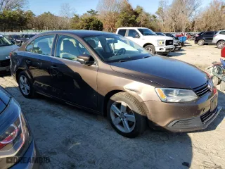2014 Volkswagen Jetta Sedan TDI with VIN 3VWLL7AJ0EM410450, listed as a Copart auction lot 82784874 with 122,107 mi miles and Salvage Title. Bid and sale history available at carsss.com. Image 4.