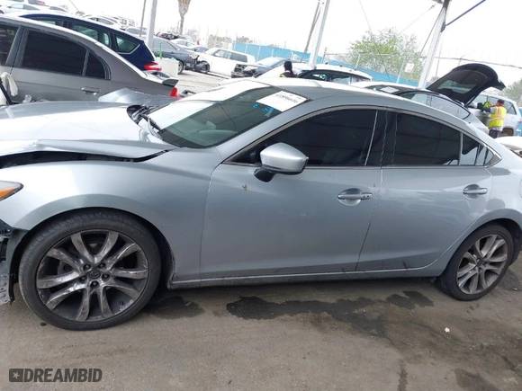 2017 Mazda Mazda6 Touring with VIN JM1GL1V59H1122054, listed as a IAAI auction lot 41896616 with 114,422 mi miles. Bid and sale history available at carsss.com. Image 15.