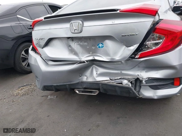 2019 Honda Civic Sedan Sport with VIN 19XFC2F84KE200822, listed as a IAAI auction lot 41753976 with 77,090 mi miles. Bid and sale history available at carsss.com. Image 18.