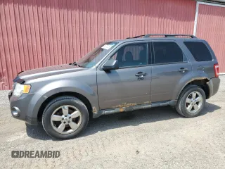 2011 Ford Escape XLT z VIN 1FMCU9DG8BKC00088, wystawiony jako Copart lot #61679545 z przebiegiem 216 578 mil mil oraz Czysty tytuł • Clean title. Historia ofert i sprzedaży dostępna na DreamBid. Obrazek 1.