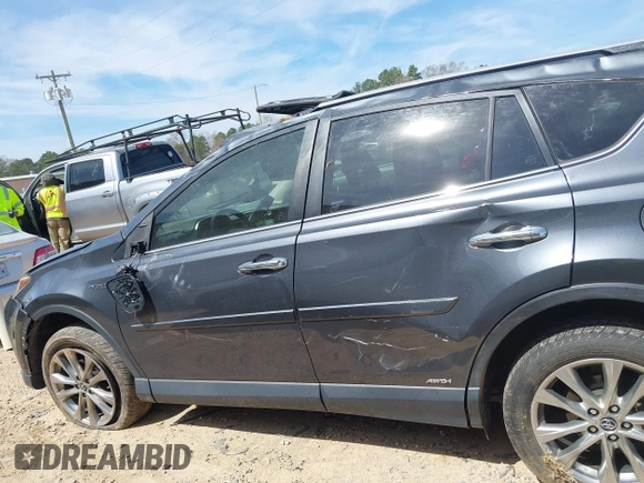 2016 Toyota RAV4 Hybrid Limited with VIN JTMDJREV7GD047729, listed as a IAAI auction lot 41833765 with 114,830 mi miles. Bid and sale history available at carsss.com. Image 14.